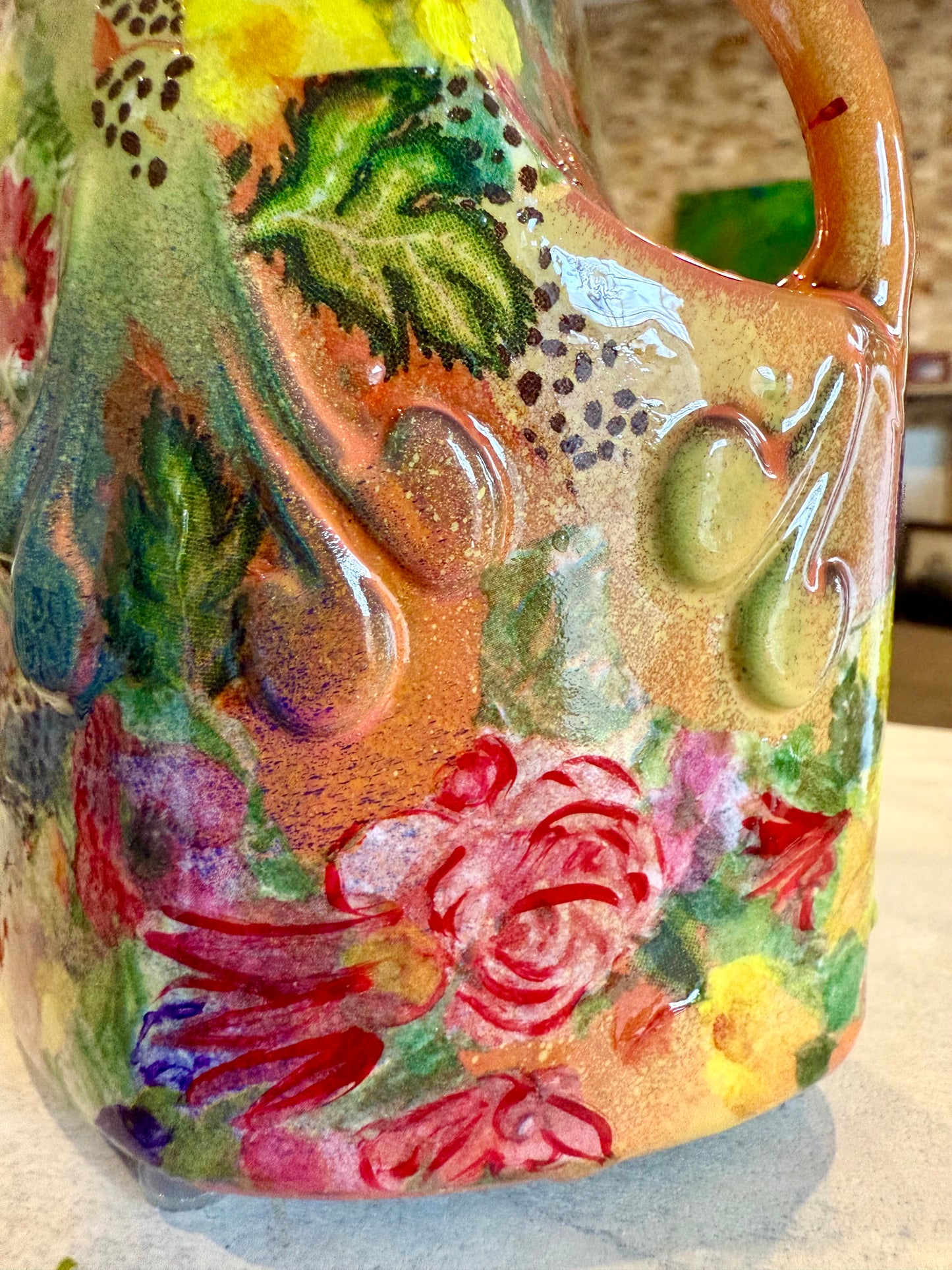 Repurposed ceramic jug flower vase