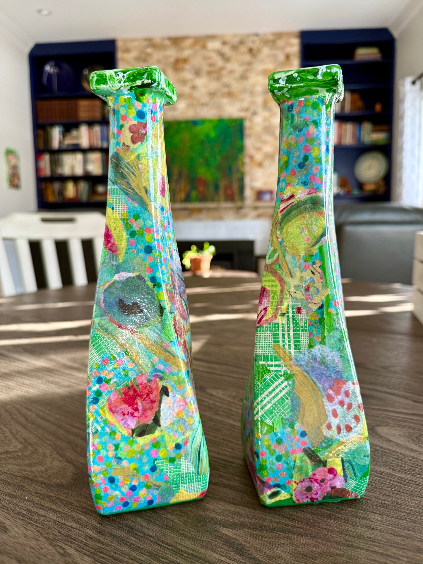 Pair of colorful whimsical flower vases repurposed tequila bottles