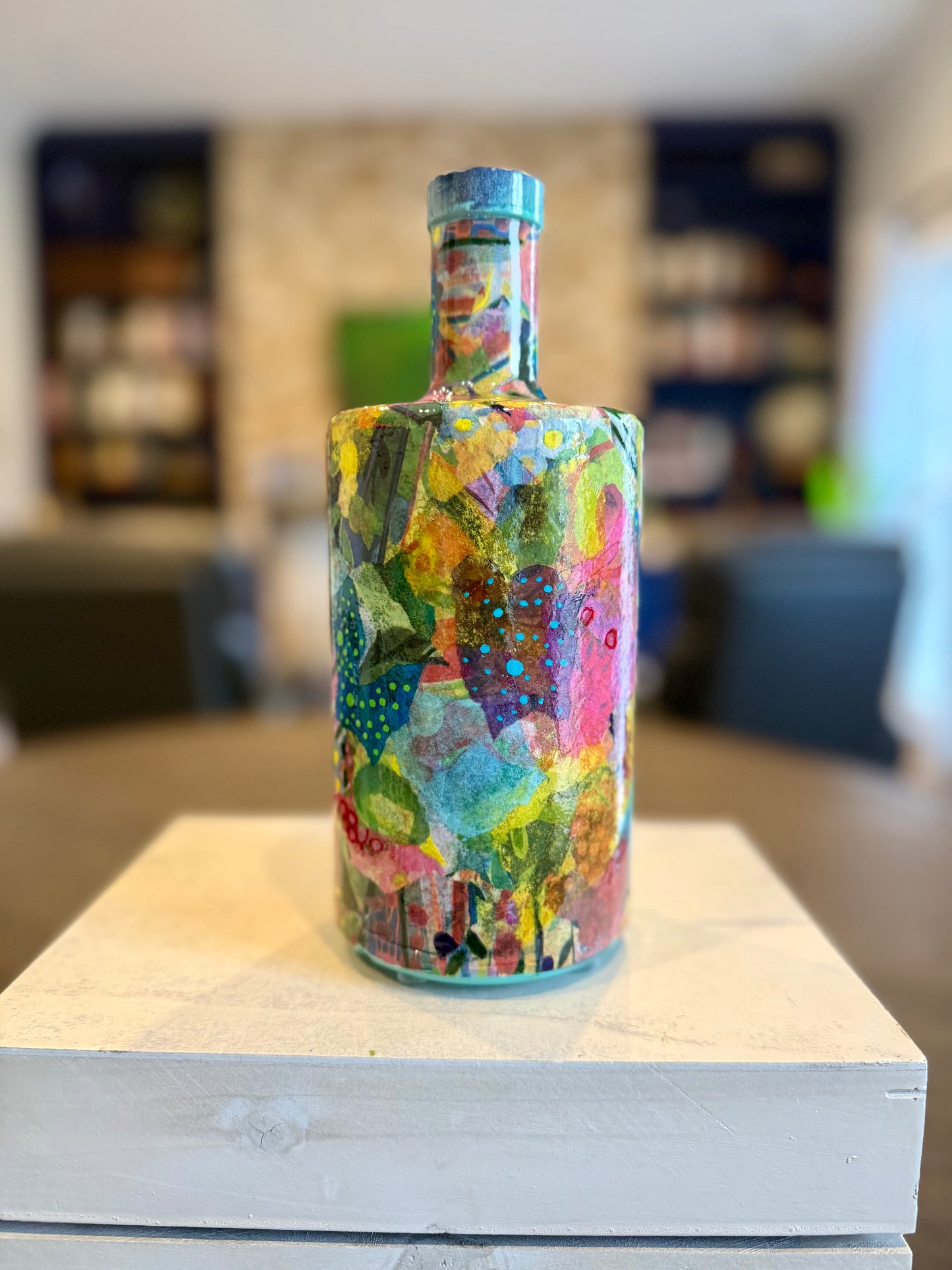 Repurposed liquor bottle maximalist flower vase