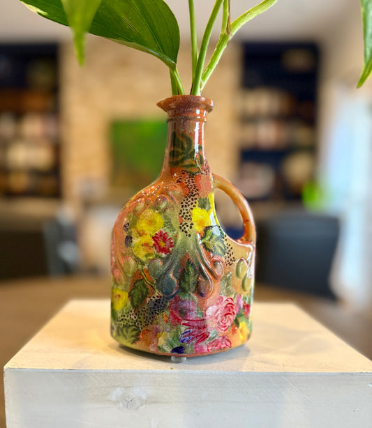 Repurposed ceramic jug flower vase