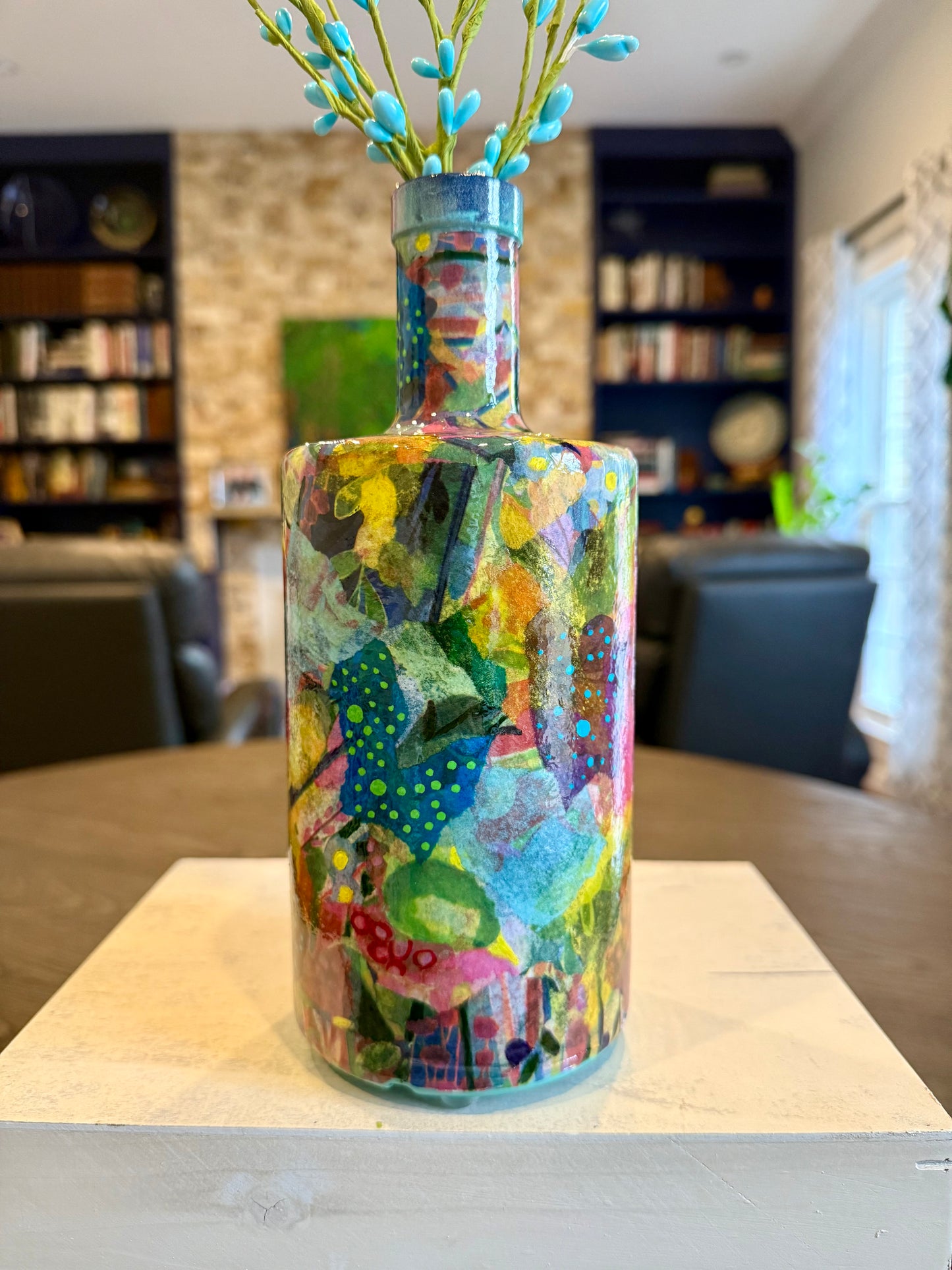 Repurposed liquor bottle maximalist flower vase
