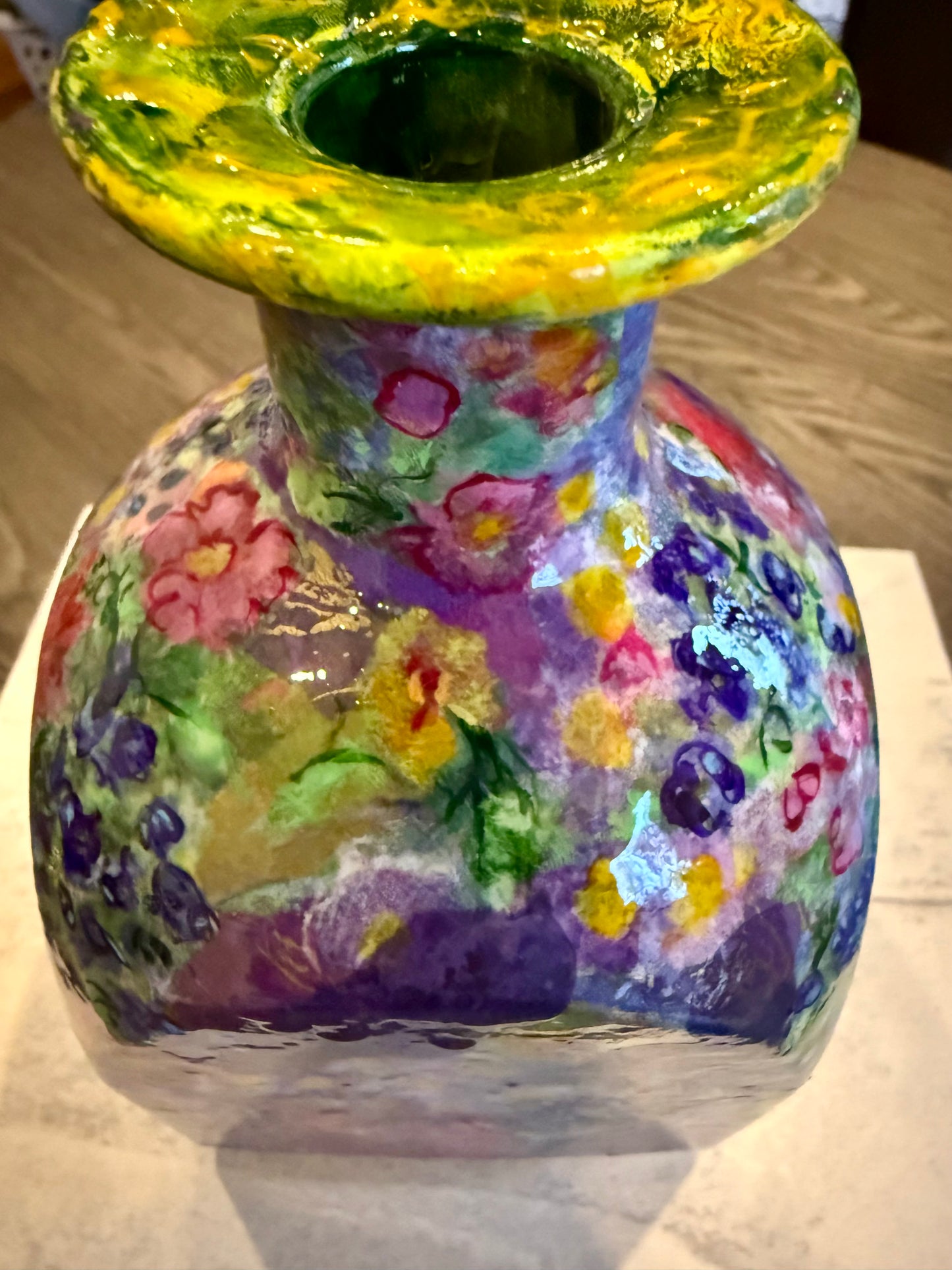 Maximalist style repurposed tequila bottle flower vase
