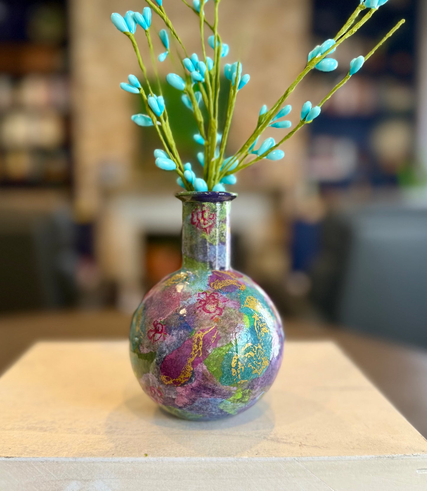 Small round colorful bud vase