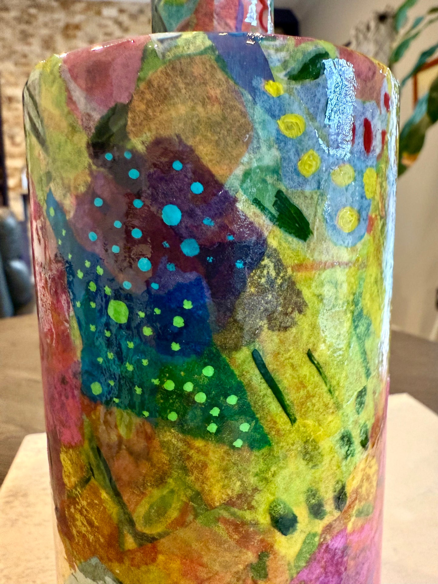 Repurposed liquor bottle maximalist flower vase
