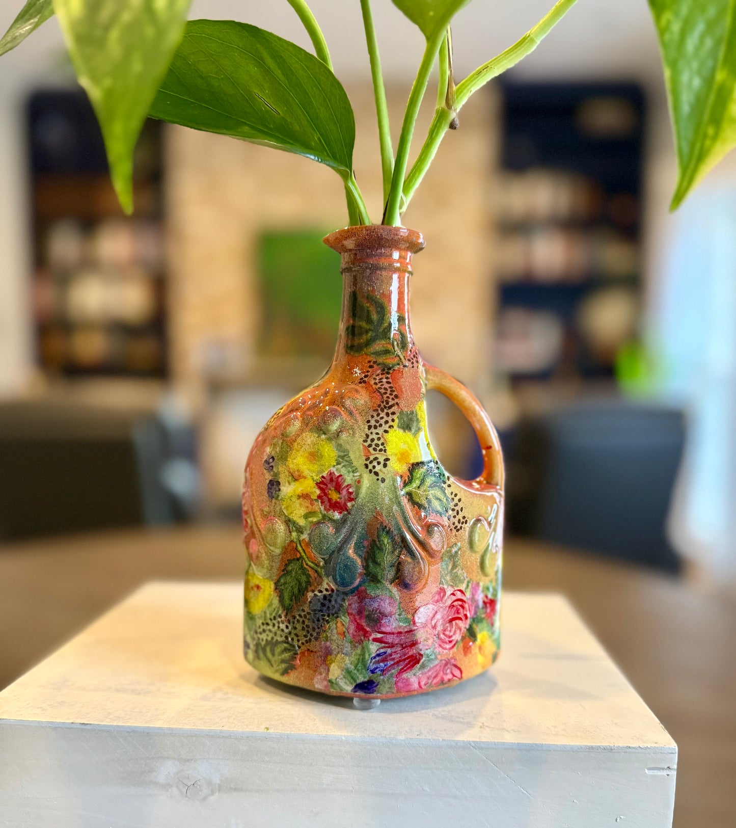 Repurposed ceramic jug flower vase