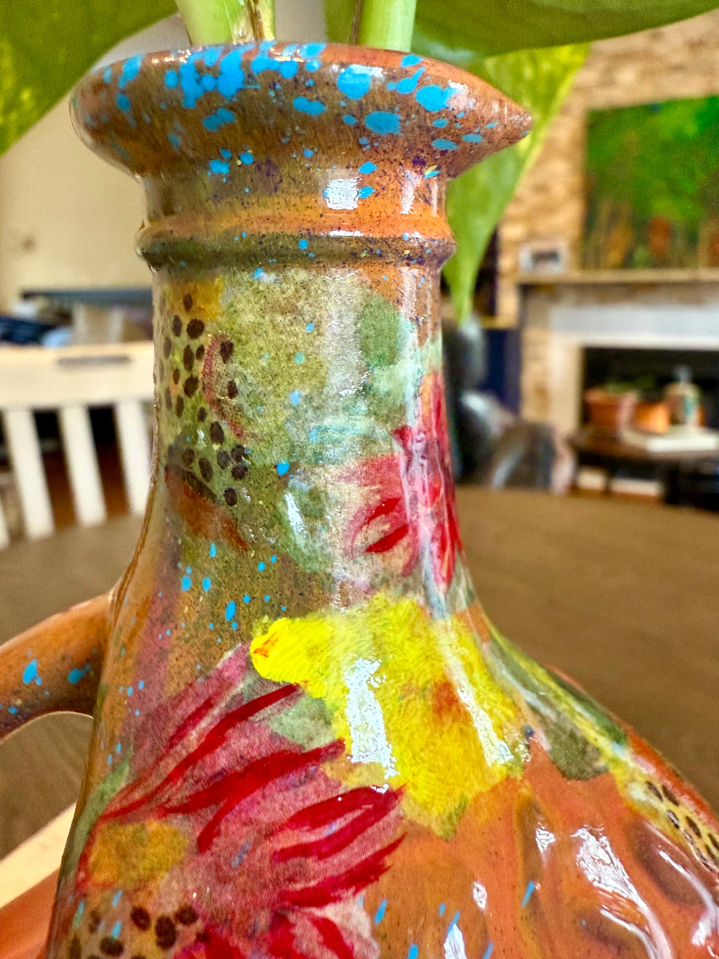 Repurposed ceramic jug flower vase